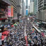 Honk Kong protests -- the more the authorities threaten and demand order, the more people come out to protest. After a mob tried to stir up a riot (the police were blamed), the crowds grew even bigger. Photo by Reuters.