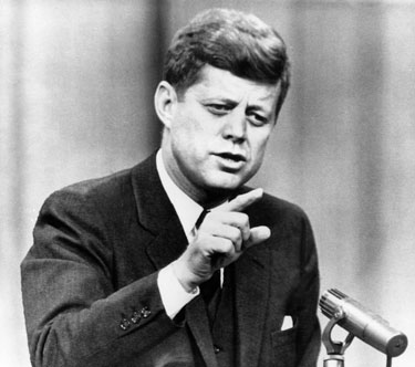 Pres. John F. Kennedy speaking before Congress. He is our modern archetype of 'the president' though none have lived up to his style since. Photographer unknown.