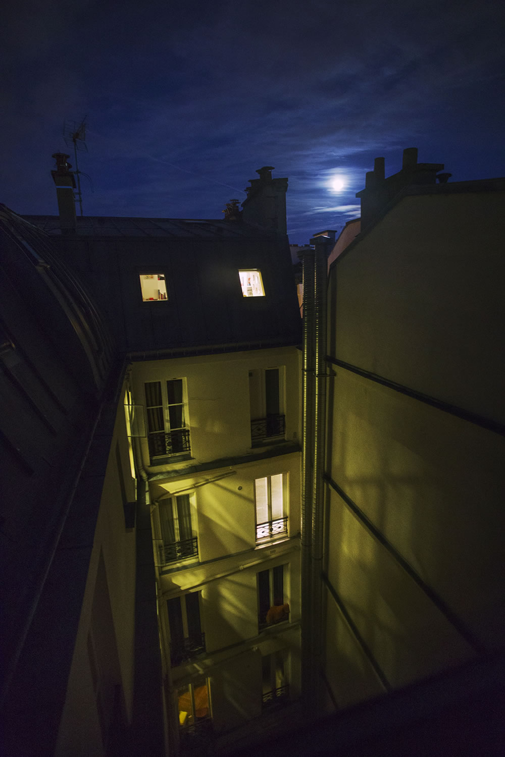 Moonrise from the 7th floor, deep in the heart of Paris, at the end of rue de la Lune.   