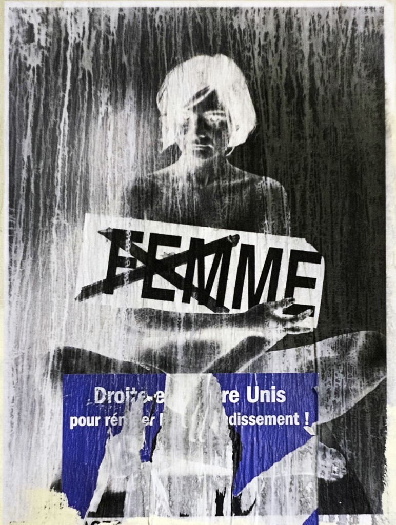 Street art semi-destroyed.  Femme - Woman.  Droits - Rights.  Unis - United.