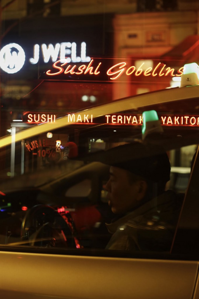 Taxi driver, cruising down Avenue des Gobelins in Paris.