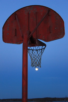 Shooting hoops with the Moon on the eve of the eclipse March 22, 2016. Photo by Amanda Painter.