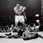 Muhammad Ali standing over Sonny Liston in 1965 in their second fight. Ali was declared the winner in that fight and retained the world title. Credit: John Rooney/Associated Press.