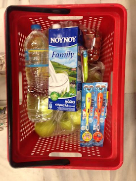 Groceries purchased for a refugee family in Vial, Greece -- a notoriously under-supplied government refugee camp. Photo by Marcy Franck.