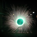 Rotating_green_fireworks_in_a_wheel_spinning_Holland