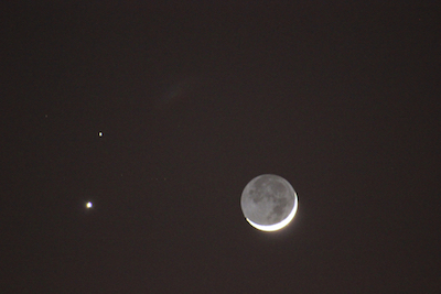 The February 2015 conjunction of Venus and Mars, with a crescent Moon mimicking this week's Full Moon thanks to a phenomenon known as "Earthshine." Photo by Amanda Painter. 