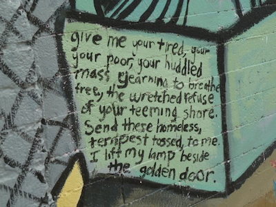 Excerpt from "The New Colossus" by Emma Lazarus; photo of a mural in Phoenix, Arizona. 