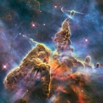 “Mystic Mountain,” a detail from the much more extensive Carina Nebula, which astronomers are studying the complicated physical processes that form new stars. Photo by NASA, ESA, and M. Livio and the Hubble 20th Anniversary Team (STScI)
